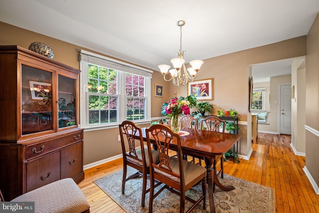 503 Emily Cir, West Chester, PA 19382 - dining space featuring a chandelier, plenty of natural light, light wood-style flooring, and baseboards
