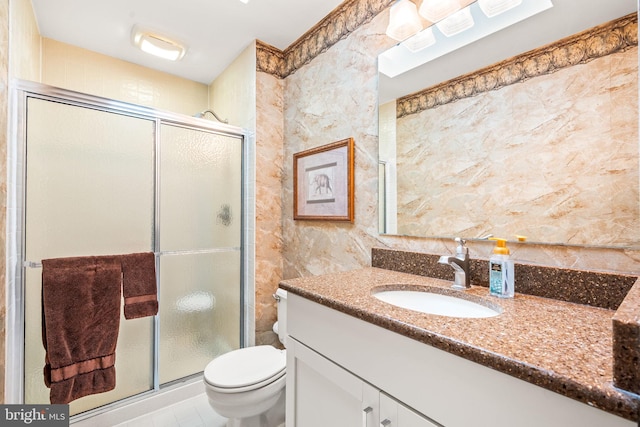 503 Emily Cir, West Chester, PA 19382 - bathroom with toilet, vanity, a stall shower, tile walls, and tile patterned flooring