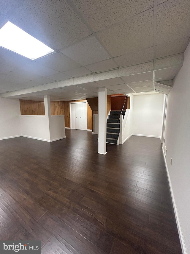 503 Emily Cir, West Chester, PA 19382 - finished below grade area with baseboards, stairs, dark wood-style flooring, and a drop ceiling