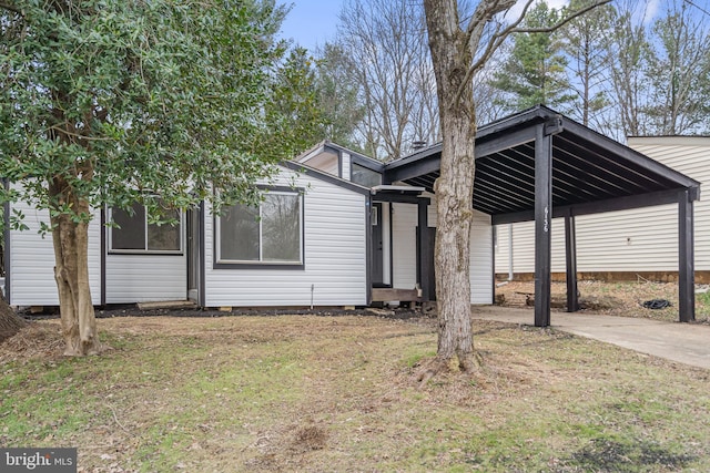 6136 Sinbad Pl, Columbia, MD 21045 - view of front of house with a front yard and a carport