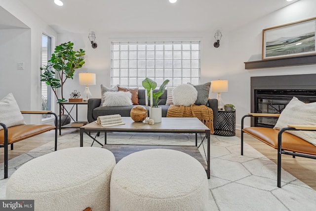 6136 Sinbad Pl, Columbia, MD 21045 - living room featuring wood finished floors, recessed lighting, and a glass covered fireplace