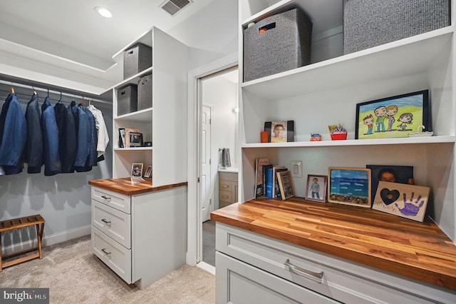 4788 Charter Ct, Woodbridge, VA 22192 - walk in closet featuring light carpet