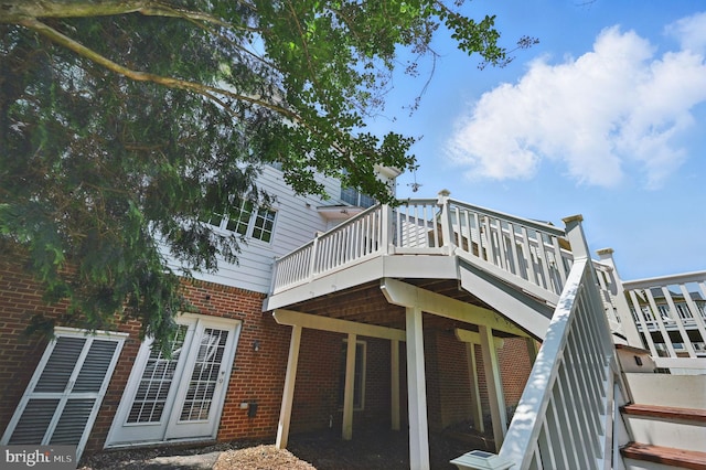 4788 Charter Ct, Woodbridge, VA 22192 - back of property with a deck and brick siding