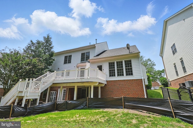 4788 Charter Ct, Woodbridge, VA 22192 - back of property featuring brick siding, stairway, and a deck