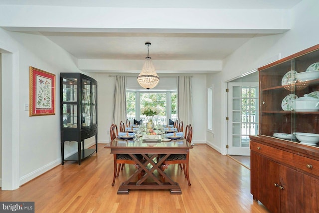 37193 Adams Green Ln, Middleburg, VA 20117 - dining space with light wood finished floors, a chandelier, and beam ceiling