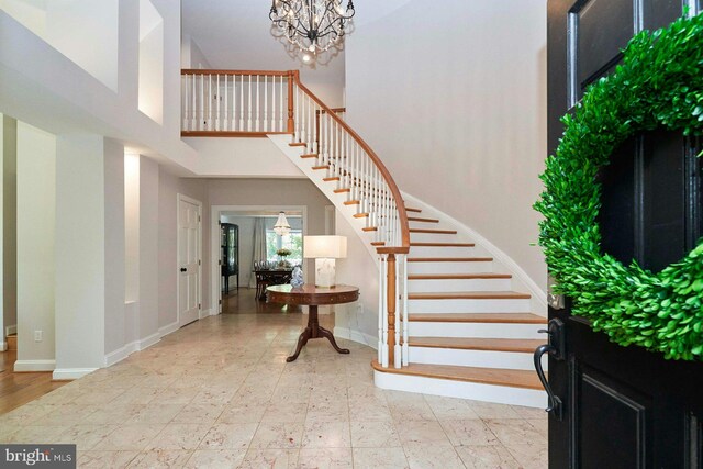 37193 Adams Green Ln, Middleburg, VA 20117 - entryway featuring stairs, a towering ceiling, and a chandelier