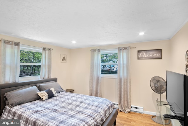 109 Knob Ct, Albrightsville, PA 18210 - bedroom featuring light wood finished floors, recessed lighting, baseboards, and baseboard heating