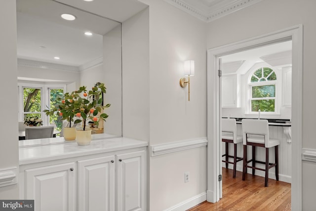 6638 Hampton View Pl, Mclean, VA 22101 - hallway with crown molding, plenty of natural light, light wood-type flooring, and recessed lighting