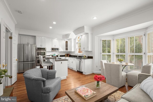 6638 Hampton View Pl, Mclean, VA 22101 - living area with crown molding, light wood-type flooring, and recessed lighting