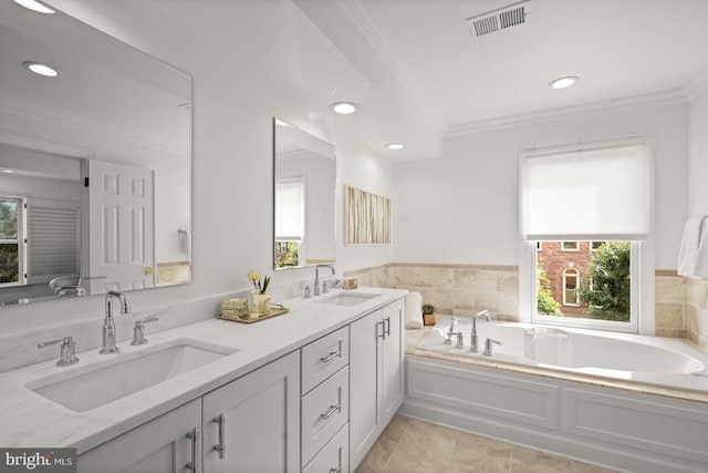 6638 Hampton View Pl, Mclean, VA 22101 - full bath with ornamental molding, a garden tub, double vanity, plenty of natural light, and recessed lighting