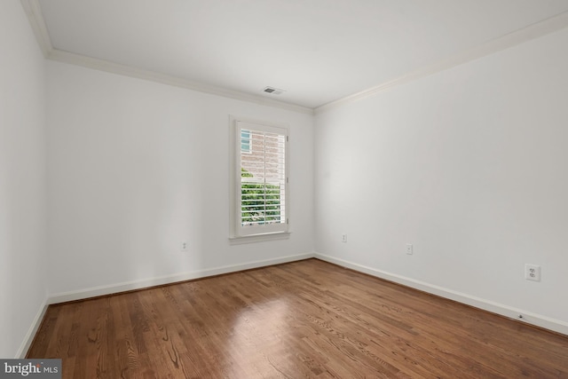 6638 Hampton View Pl, Mclean, VA 22101 - unfurnished room featuring crown molding, wood finished floors, and baseboards