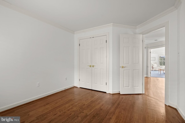 6638 Hampton View Pl, Mclean, VA 22101 - unfurnished bedroom featuring baseboards, dark wood finished floors, crown molding, and a closet