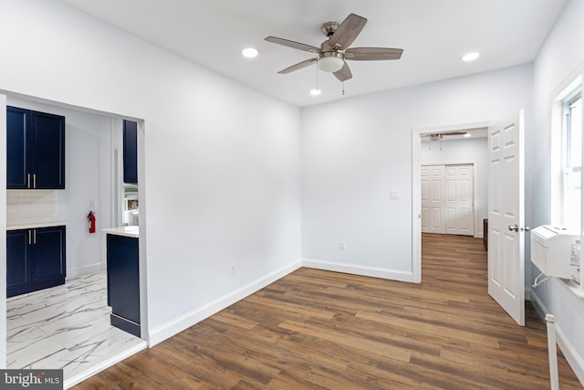213 Franklin St, Hightstown, NJ 08520 - empty room featuring ceiling fan, recessed lighting, baseboards, wood finished floors, and a fireplace