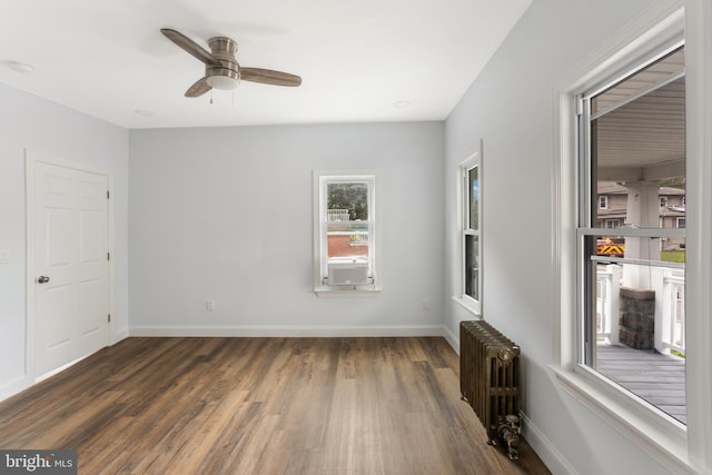 213 Franklin St, Hightstown, NJ 08520 - unfurnished room featuring radiator heating unit, a ceiling fan, wood finished floors, and baseboards