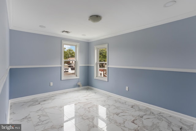 213 Franklin St, Hightstown, NJ 08520 - spare room with crown molding, baseboards, and marble look tiles