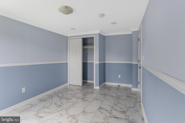 213 Franklin St, Hightstown, NJ 08520 - unfurnished bedroom featuring ornamental molding, baseboards, marble finish floors, and a closet