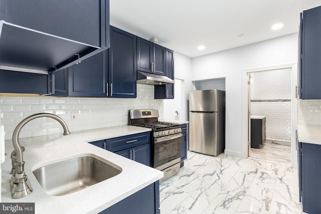 213 Franklin St, Hightstown, NJ 08520 - kitchen with stainless steel appliances, a sink, under cabinet range hood, blue cabinets, and light countertops