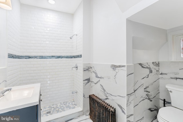 213 Franklin St, Hightstown, NJ 08520 - bathroom with radiator heating unit, tile walls, toilet, a shower stall, and vanity