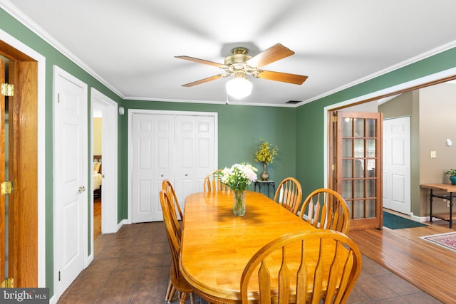 3 Cove Ct, Stafford, VA 22554 - dining space with dark tile patterned floors, a ceiling fan, ornamental molding, and baseboards