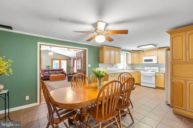 3 Cove Ct, Stafford, VA 22554 - dining area featuring plenty of natural light, light tile patterned flooring, crown molding, a ceiling fan, and baseboards