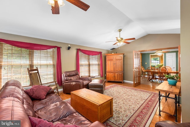 3 Cove Ct, Stafford, VA 22554 - living room with a ceiling fan, vaulted ceiling, light wood-style floors, and baseboards