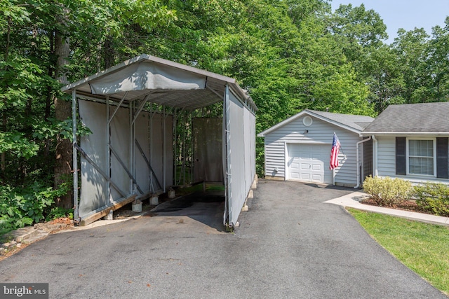 3 Cove Ct, Stafford, VA 22554 - garage featuring driveway and a detached carport