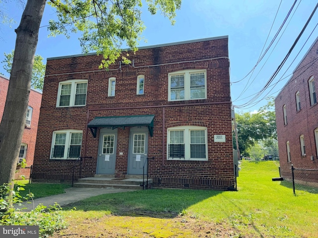 513 45th St NE, Washington, DC 20019 - view of front of house with brick siding and a front lawn