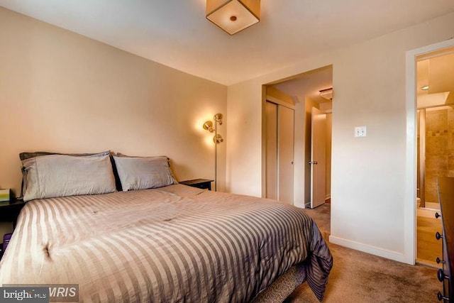 608 S Washington St, Baltimore, MD 21231 - bedroom featuring carpet flooring, baseboards, and a closet