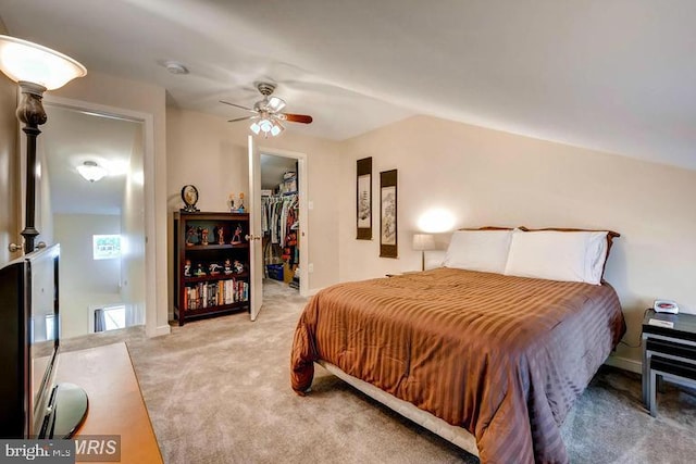 608 S Washington St, Baltimore, MD 21231 - carpeted bedroom with a walk in closet, ceiling fan, a closet, and lofted ceiling
