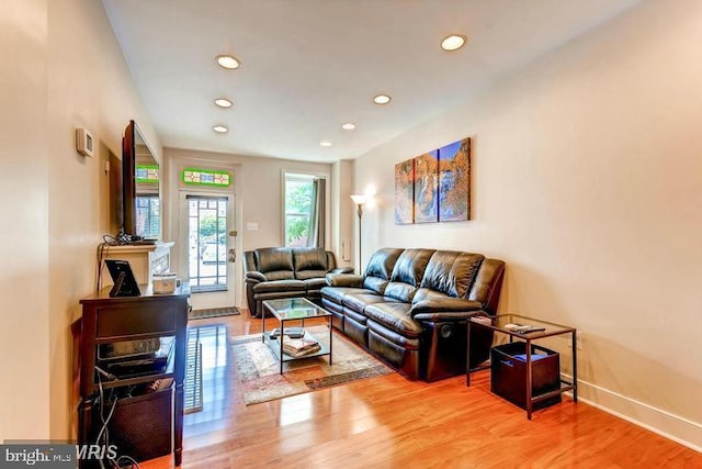 608 S Washington St, Baltimore, MD 21231 - living area featuring recessed lighting, wood finished floors, and baseboards