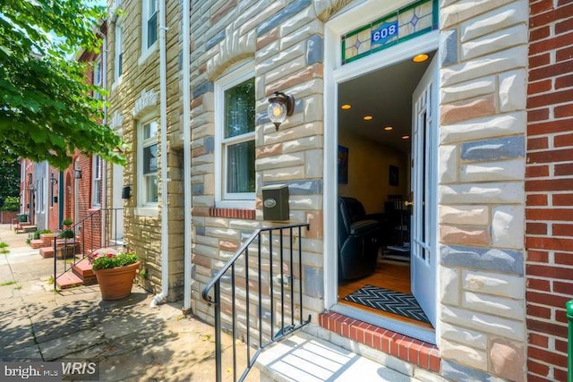 608 S Washington St, Baltimore, MD 21231 - doorway to property with stone siding and brick siding