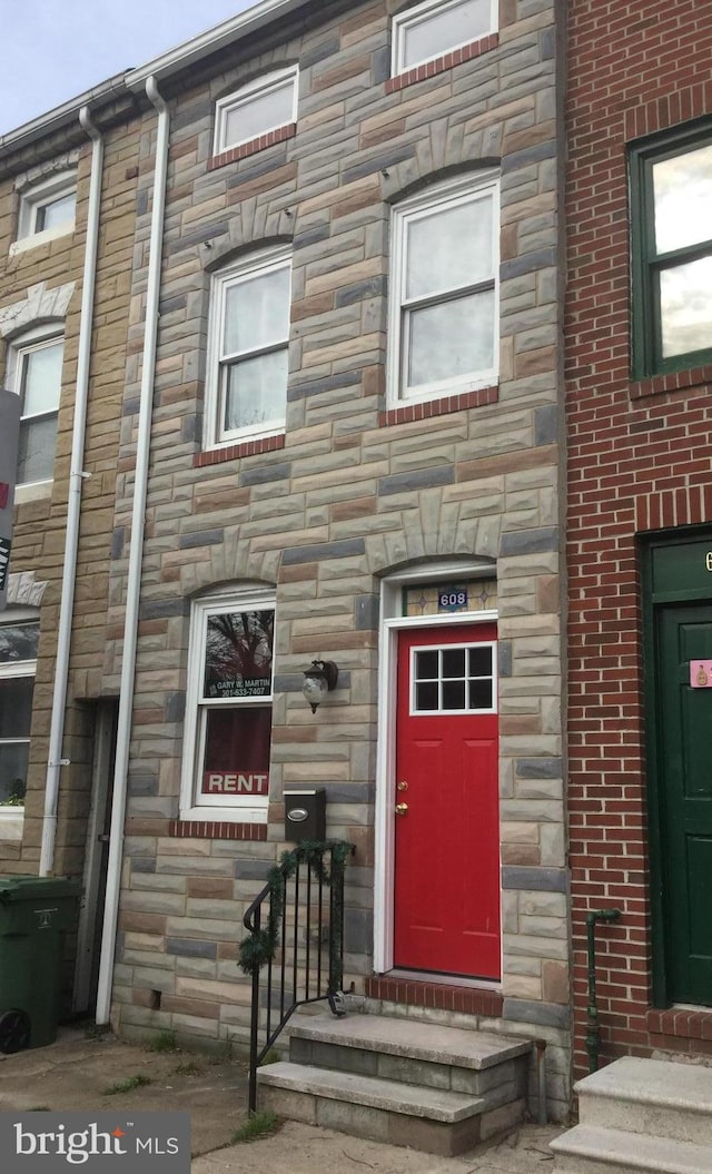 608 S Washington St, Baltimore, MD 21231 - view of exterior entry featuring stone siding