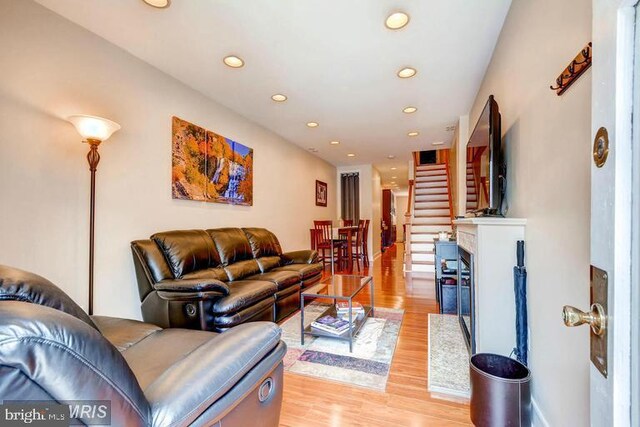 608 S Washington St, Baltimore, MD 21231 - living room with light wood-type flooring, recessed lighting, and stairs