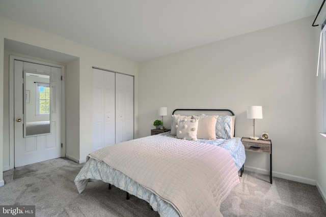 106 W Montgomery St, Baltimore, MD 21230 - carpeted bedroom featuring baseboards and a closet