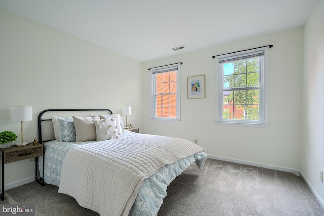 106 W Montgomery St, Baltimore, MD 21230 - bedroom with baseboards and carpet floors