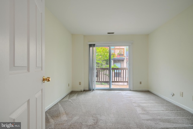 106 W Montgomery St, Baltimore, MD 21230 - carpeted spare room featuring baseboards