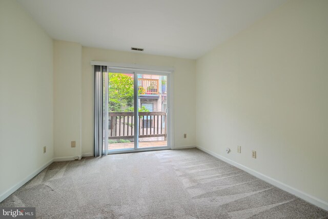 106 W Montgomery St, Baltimore, MD 21230 - empty room featuring carpet flooring and baseboards