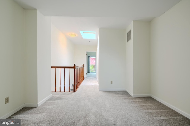 106 W Montgomery St, Baltimore, MD 21230 - corridor featuring carpet floors and baseboards