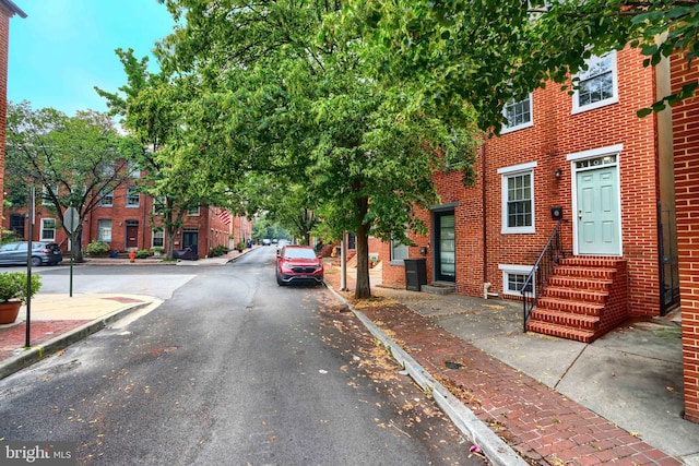 106 W Montgomery St, Baltimore, MD 21230 - view of asphalt street featuring sidewalks, curbs, and entry steps