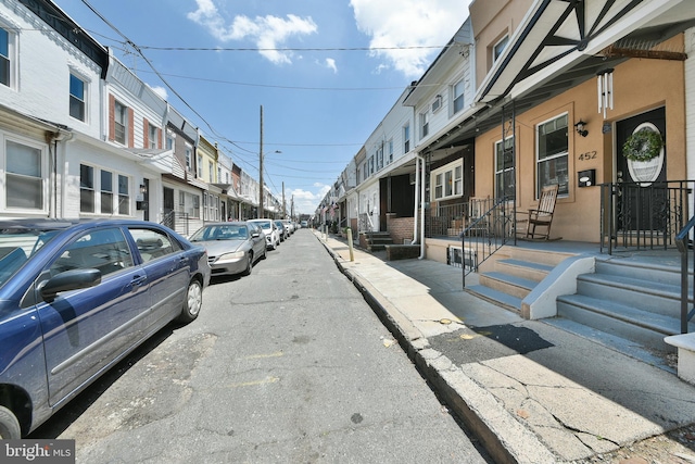 452 Fitzgerald St, Philadelphia, PA 19148 - view of asphalt road with street lighting, a residential view, sidewalks, and curbs