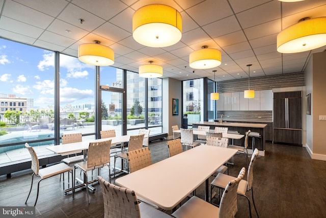 2101 Market St Unit 1104, Philadelphia, PA 19103 - dining space featuring dark wood-style floors, a view of city, and floor to ceiling windows