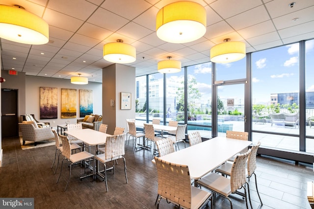 2101 Market St Unit 1104, Philadelphia, PA 19103 - dining room featuring floor to ceiling windows, wood finished floors, and a view of city
