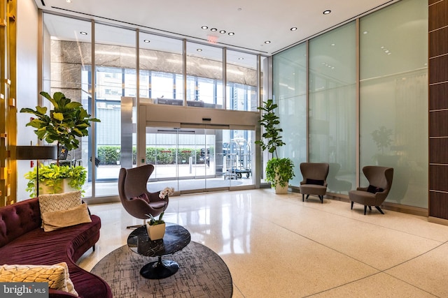 2101 Market St Unit 1104, Philadelphia, PA 19103 - community lobby featuring expansive windows, a high ceiling, and recessed lighting