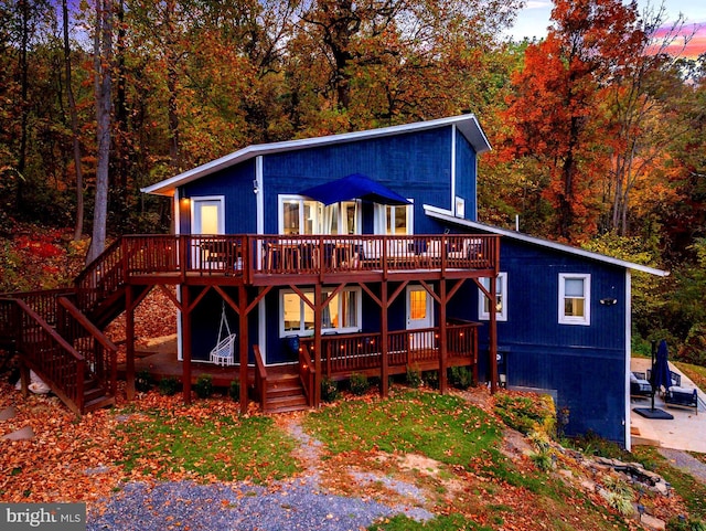726 Harmony Orchard Rd, Front Royal, VA 22630 - view of front of house featuring a deck, stairs, and a forest view