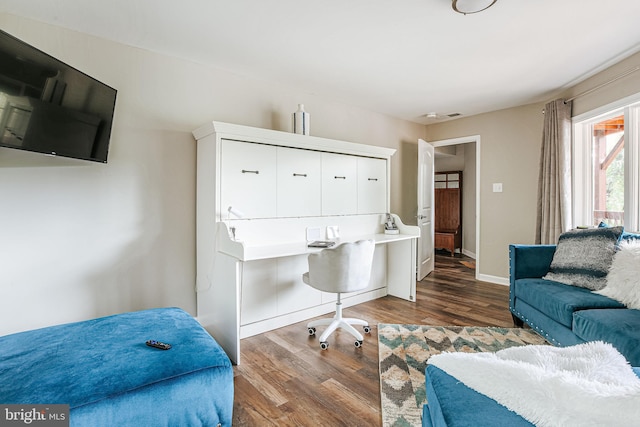 726 Harmony Orchard Rd, Front Royal, VA 22630 - living room with wood finished floors, an office area, and baseboards