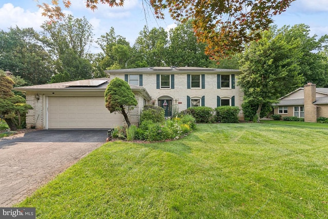 6625 Weatheford Ct, Mclean, VA 22101 - view of front of home with driveway, solar panels, a front yard, a garage, and brick siding