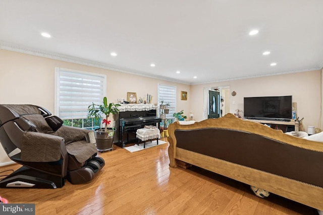6625 Weatheford Ct, Mclean, VA 22101 - living room featuring ornamental molding, recessed lighting, light wood-type flooring, and a fireplace with flush hearth