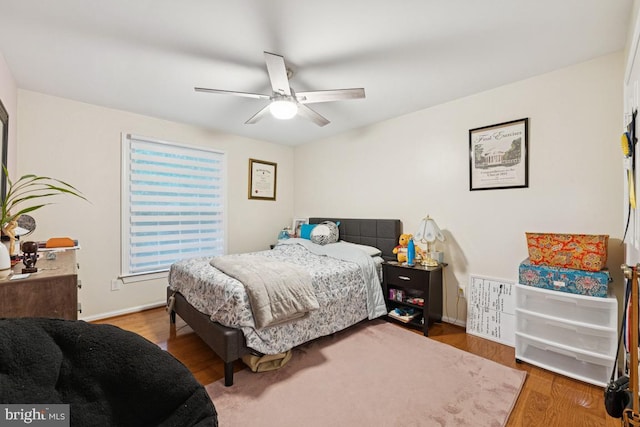 6625 Weatheford Ct, Mclean, VA 22101 - bedroom featuring wood finished floors, a ceiling fan, and baseboards