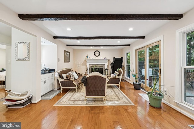 6625 Weatheford Ct, Mclean, VA 22101 - living room with light wood finished floors, beam ceiling, recessed lighting, a fireplace, and baseboards