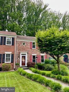 5466 Mersea Ct, Burke, VA 22015 - view of front of property with a front lawn and brick siding